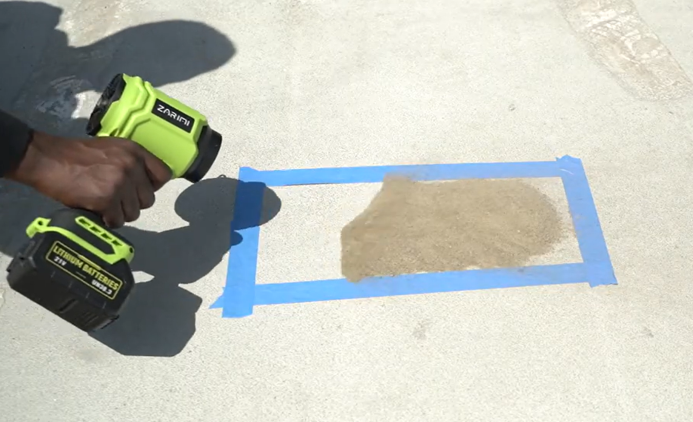 measuring Zarimi cordless leaf blower to clear up sand