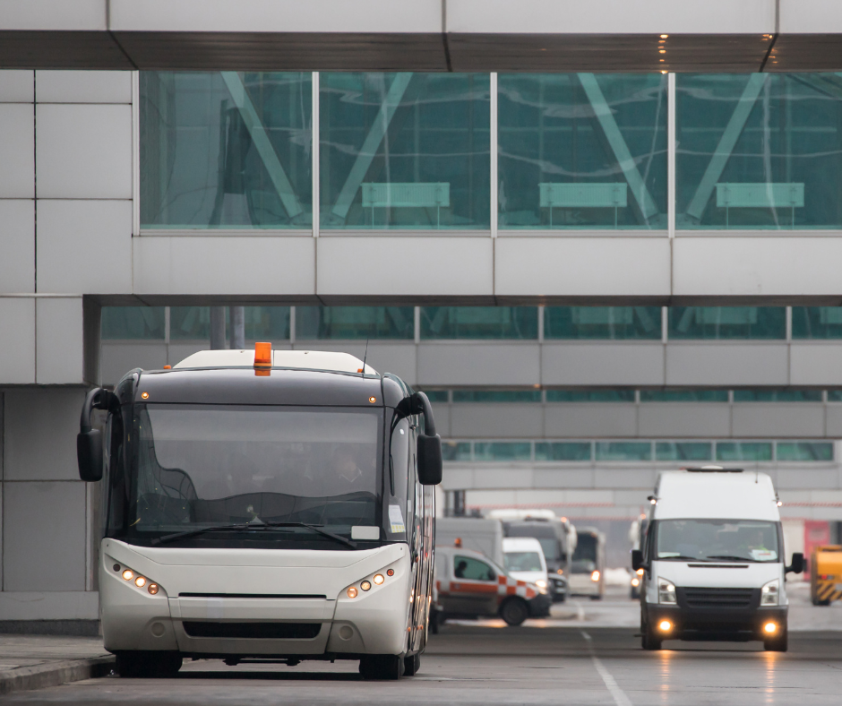 A shuttle bus ready to depart for Newark Airport, part of ground transportation options.
