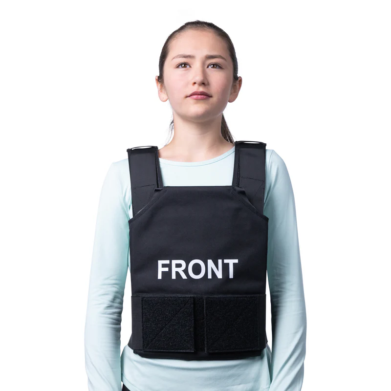 Female teenager wearing body armor for promotional purposes