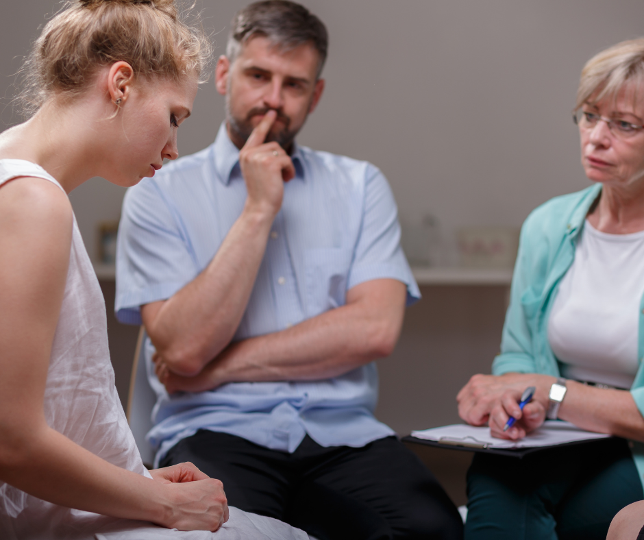                                                  A person attending an Alcoholics Anonymous meeting