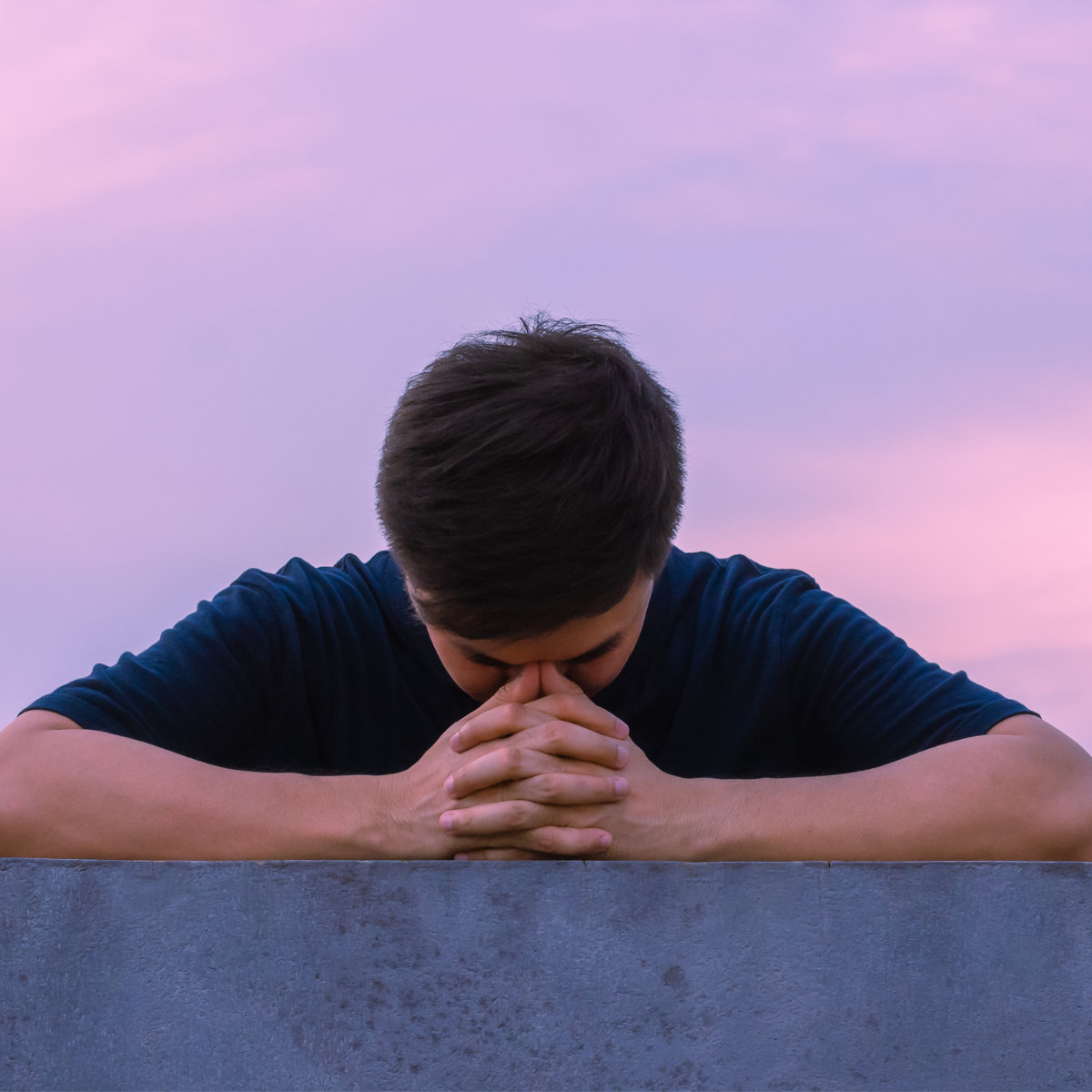 Man stressed looking down - Featured In : When An Ex Contacts You Years Later 