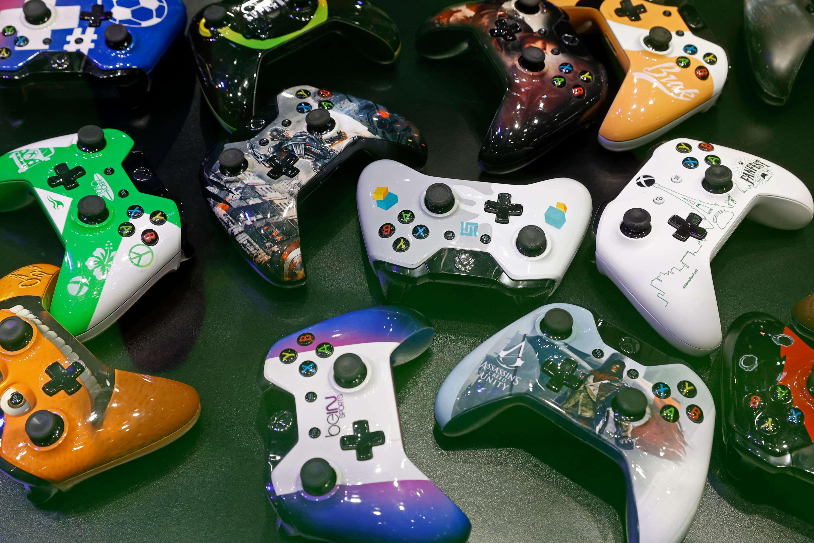 Custom game controllers are displayed during the 'Paris Games Week' on October 22, 2024 in Paris, France. 