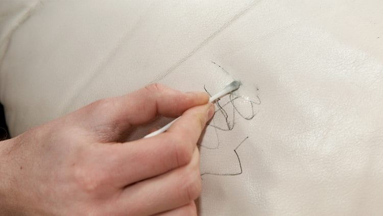 How to remove ink stains using mild soap or rubbing alcohol