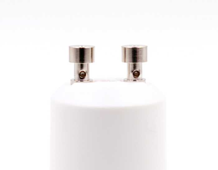 A photo of a 2 pin lightbulb base for the list of the best two-prong lightbulbs.