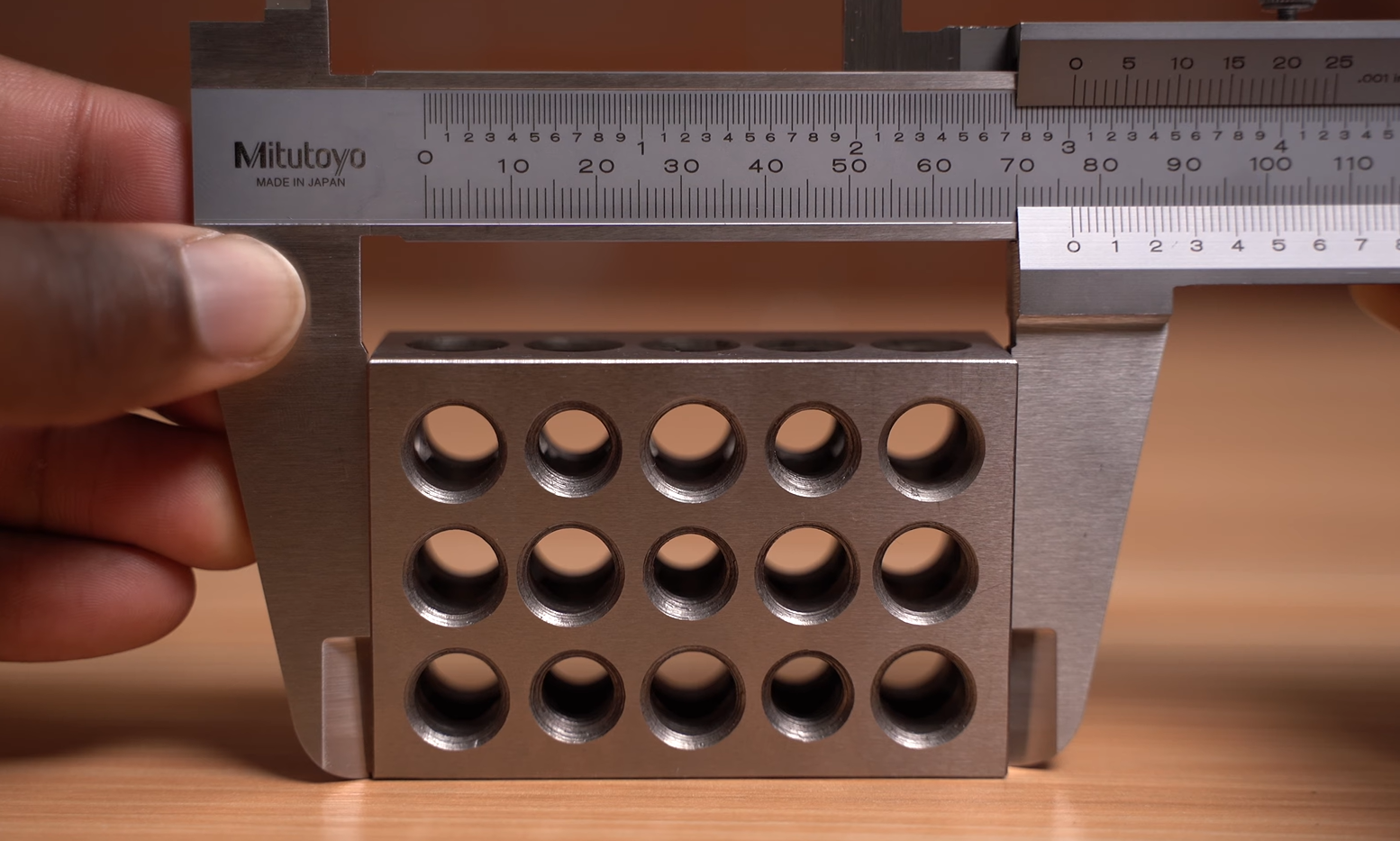 mitutoyo caliper measuring the 3 inch block