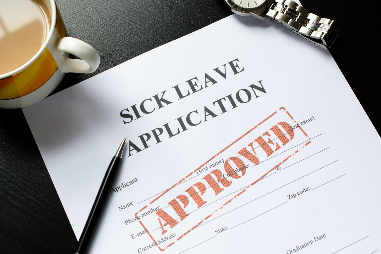 A paperwork of an approved sick leave application.