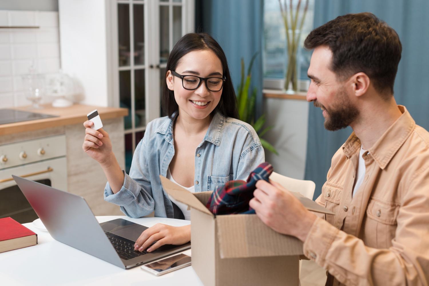 Man and woman running a dropshipping store from their home