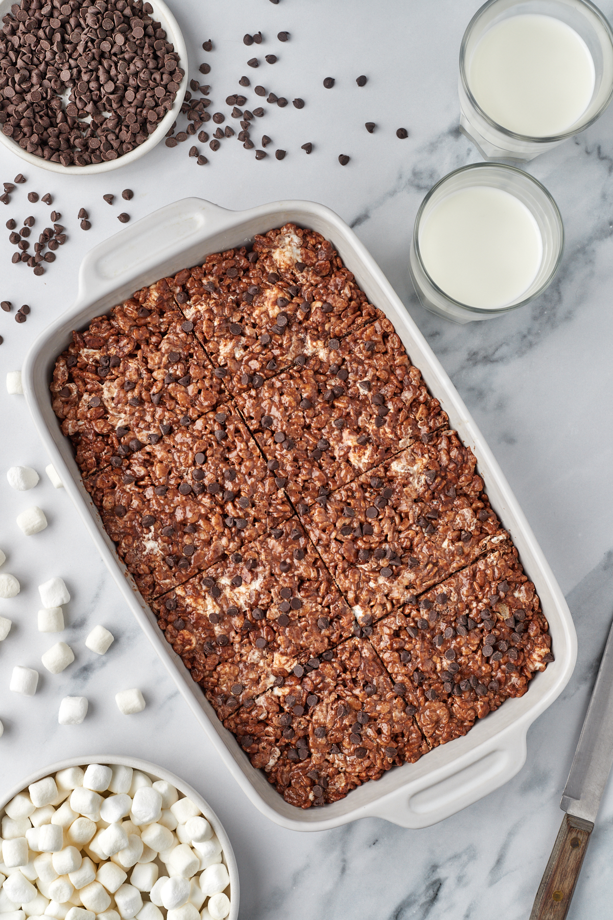chocolate rice krispie treats cut into squares in pan
