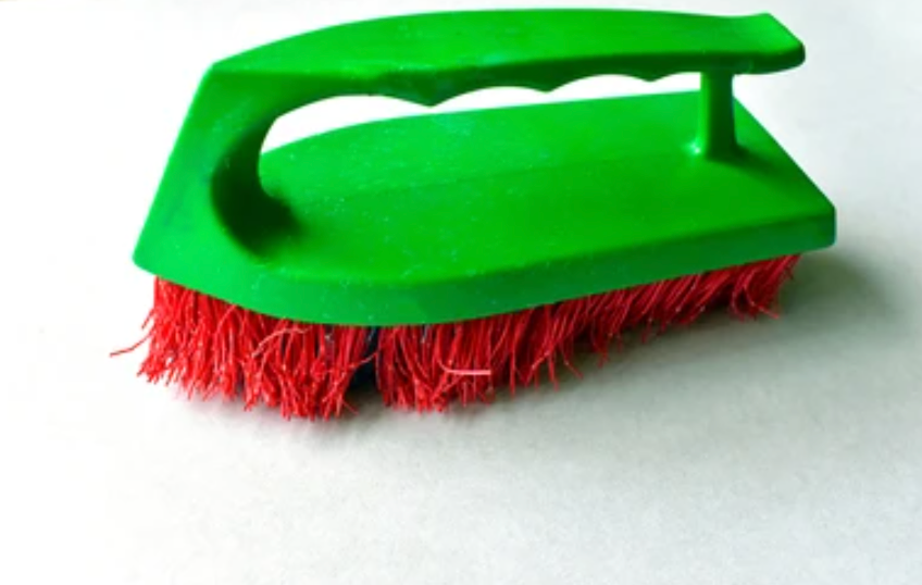 green and red silicone biodegradable cleaning brush
