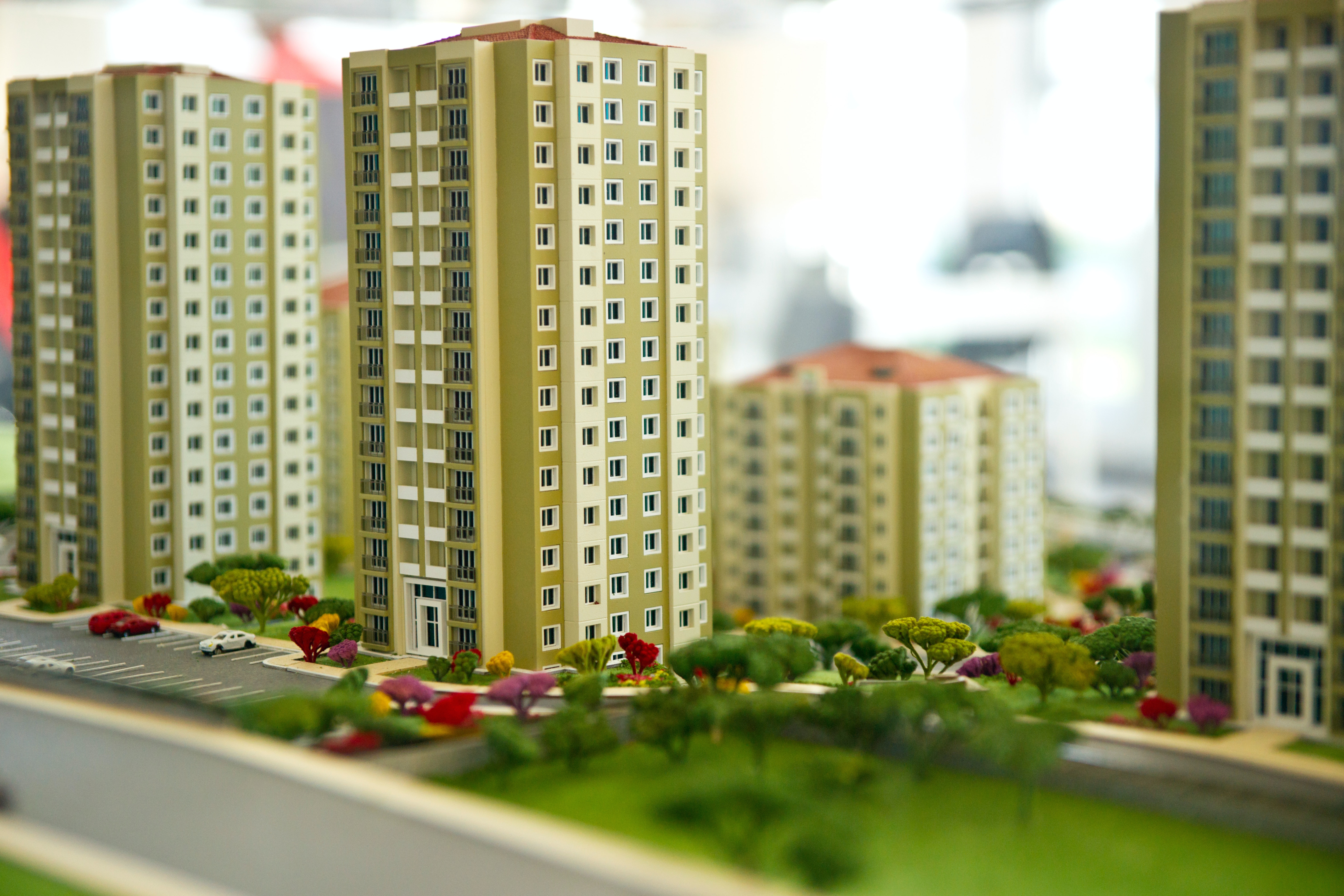 A high-rise model demonstrating small cap plans