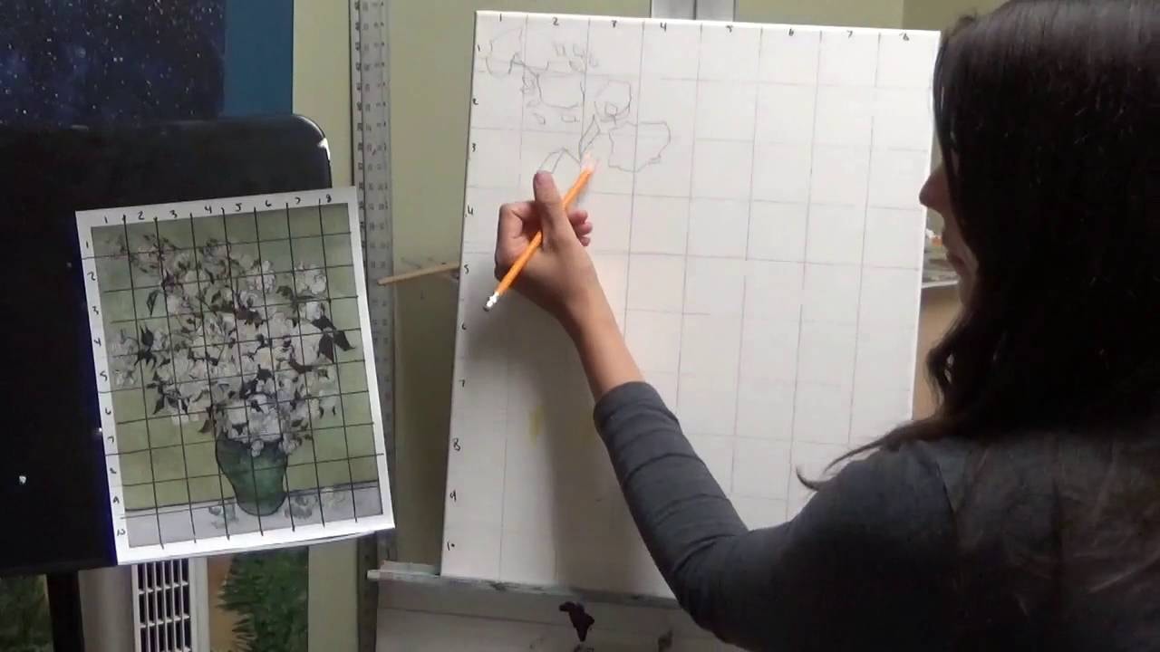 An artist applying the grid method for transfer. 