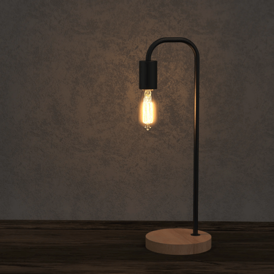 Minimal black metal table lamp with an exposed filament bulb in a Scandinavian Nordic style interior.
