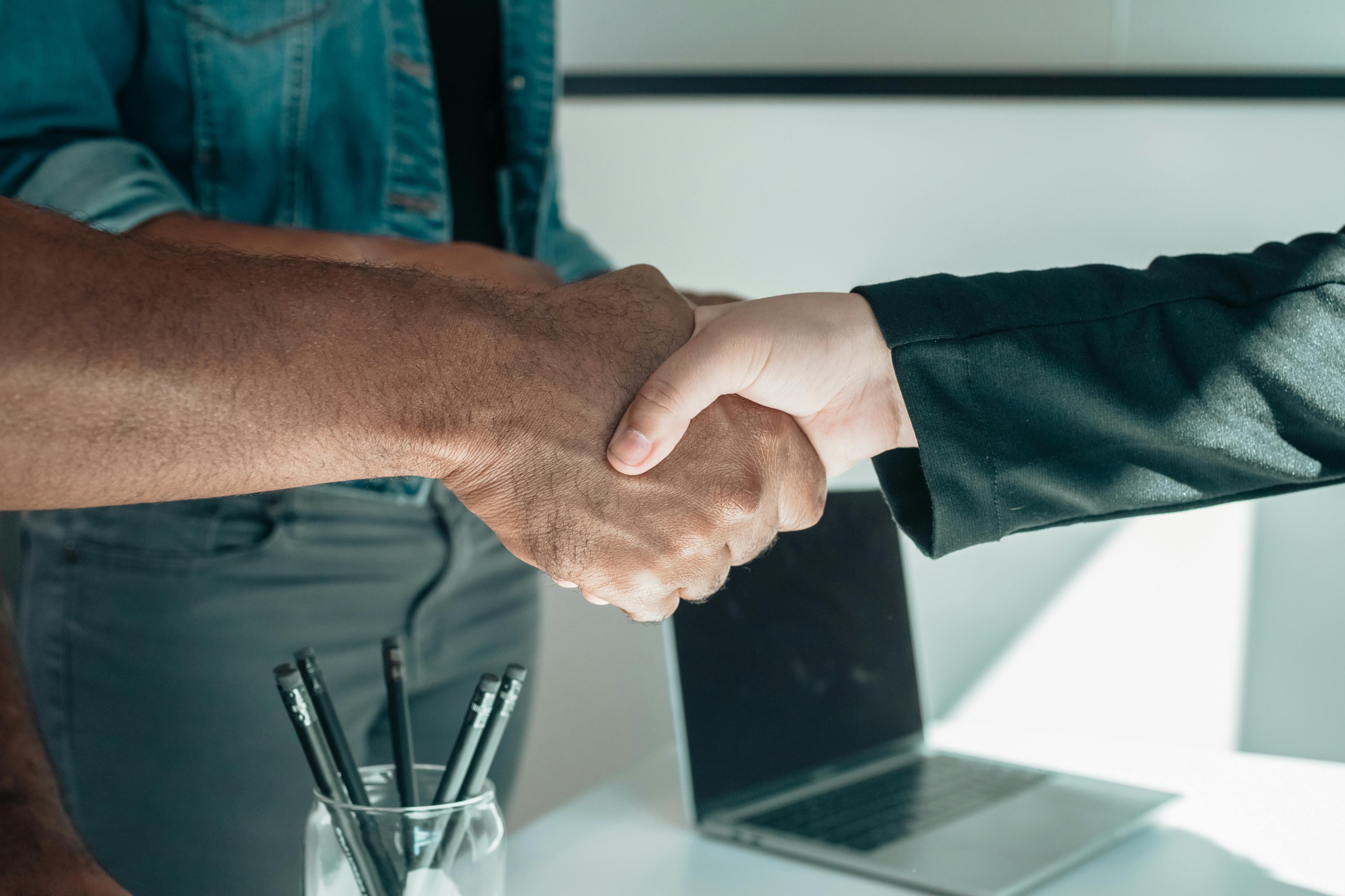 two people shaking hands