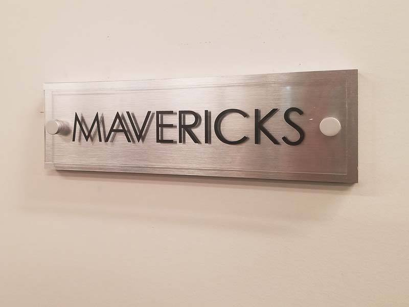 These signs are made using clear acrylic and stand out on any office door. 