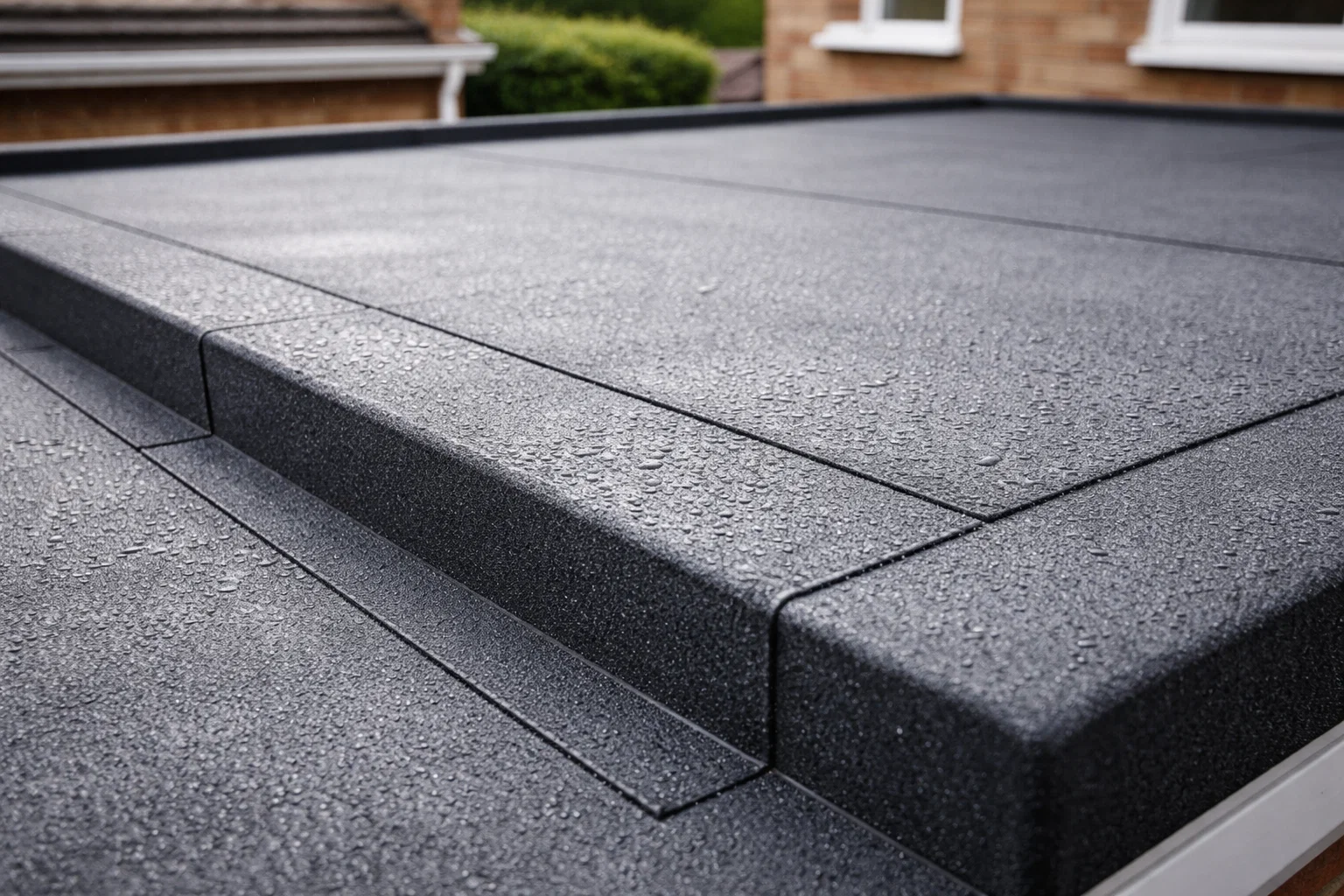 Close-up of flat roofing materials used on a Manchester property