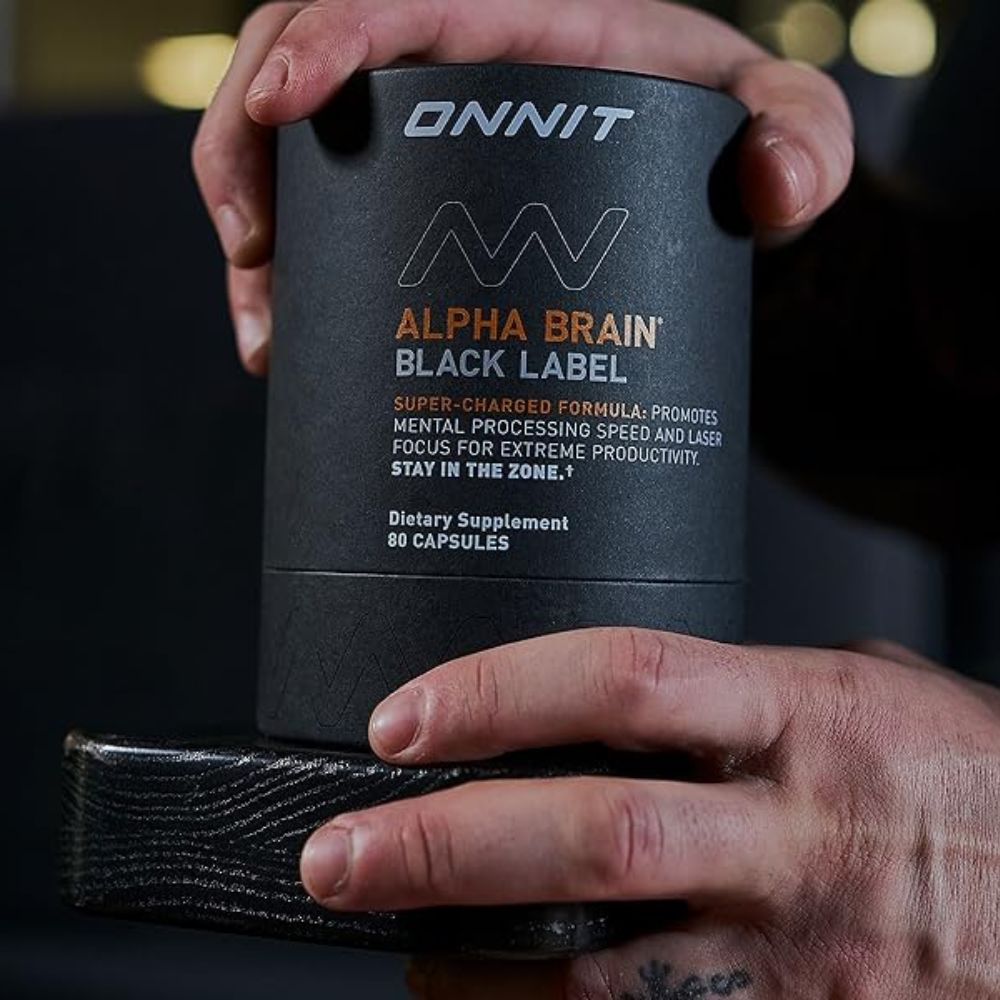 A person using Alpha Brain Black Label to improve cognitive function and performance