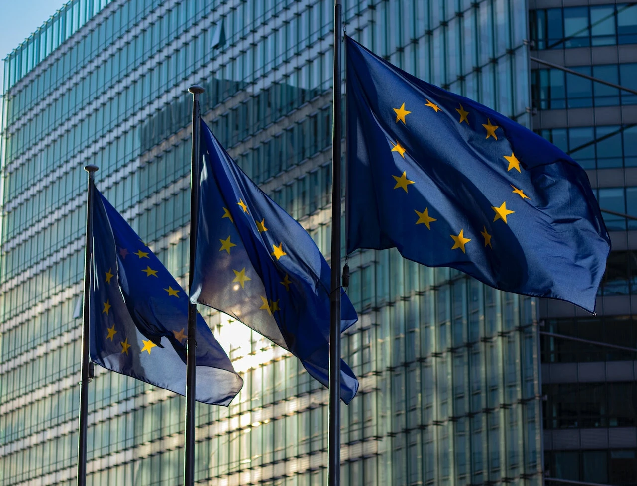 Impact of financial institutions on traditional finance showcased by European Union buildings.