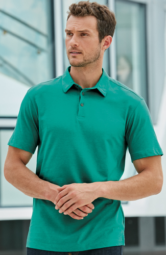 Guy wearing a polo with a sea-green fabric that absolutely pops