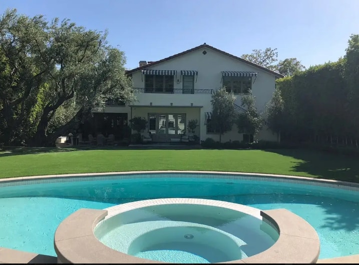 Backyard pool and lawn