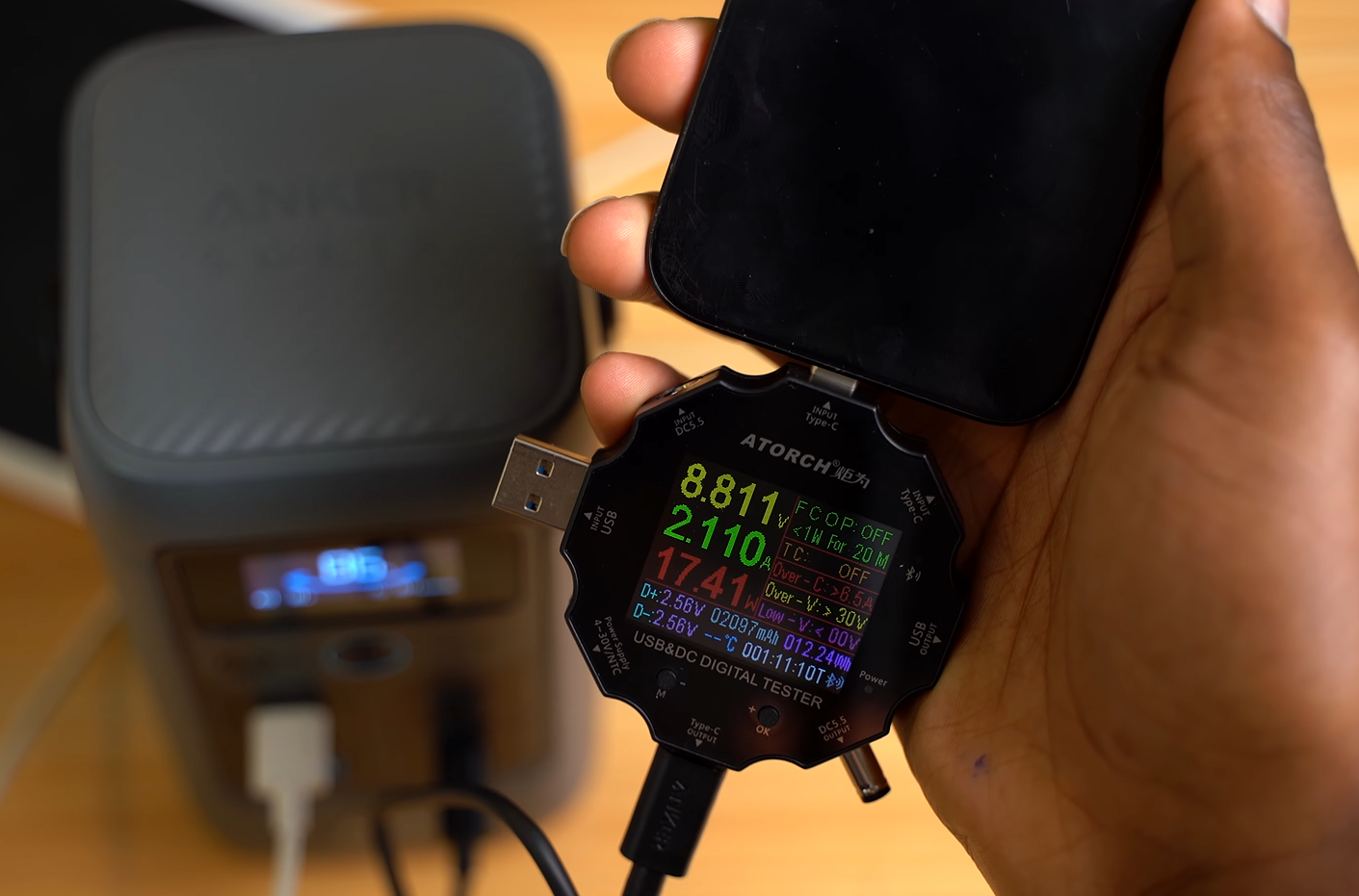 charging a mobile phone on Anker SOLIX C200 dc power station