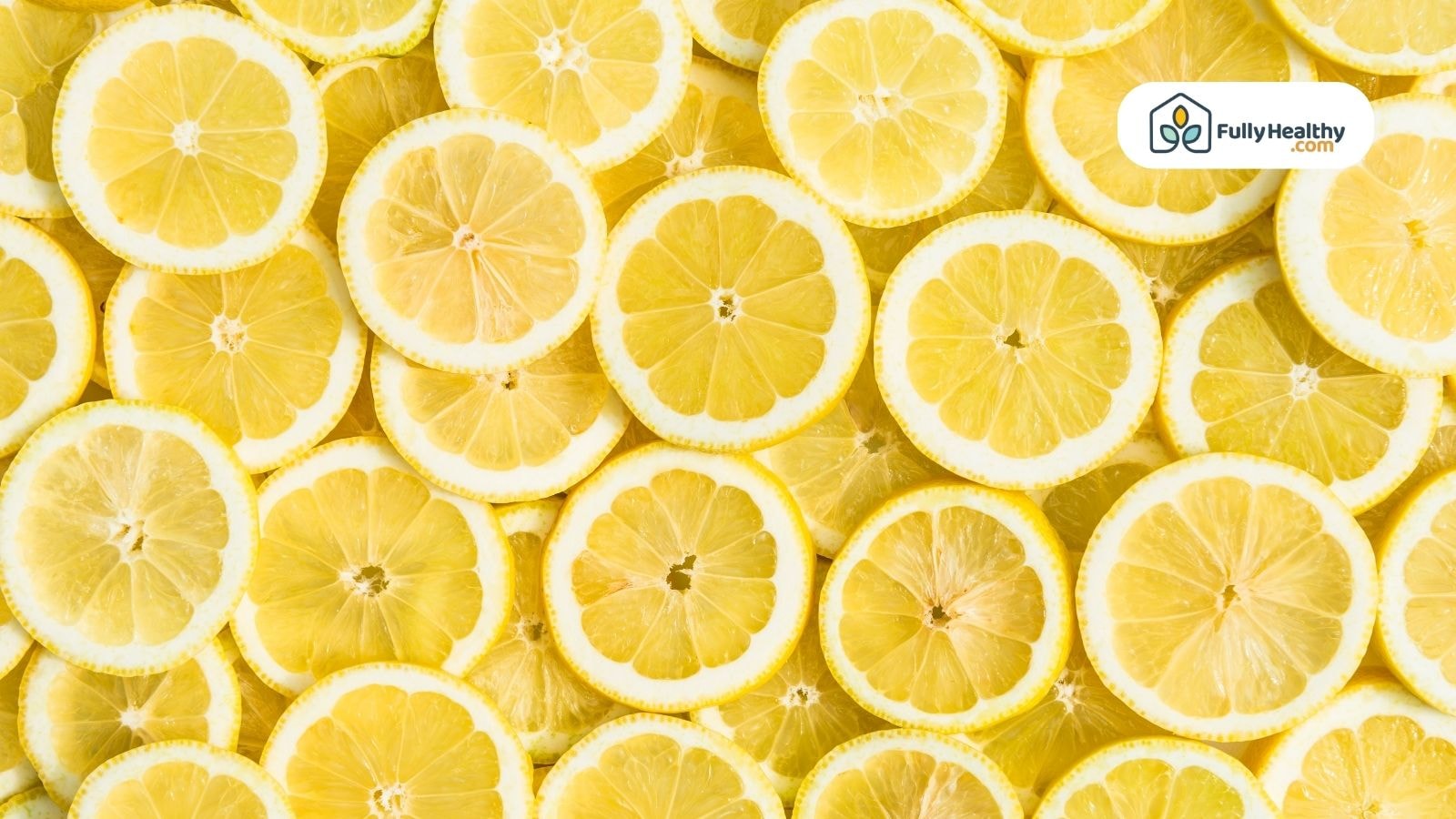 Fresh lemon slices closely arranged showing bright yellow citrus fruit texture