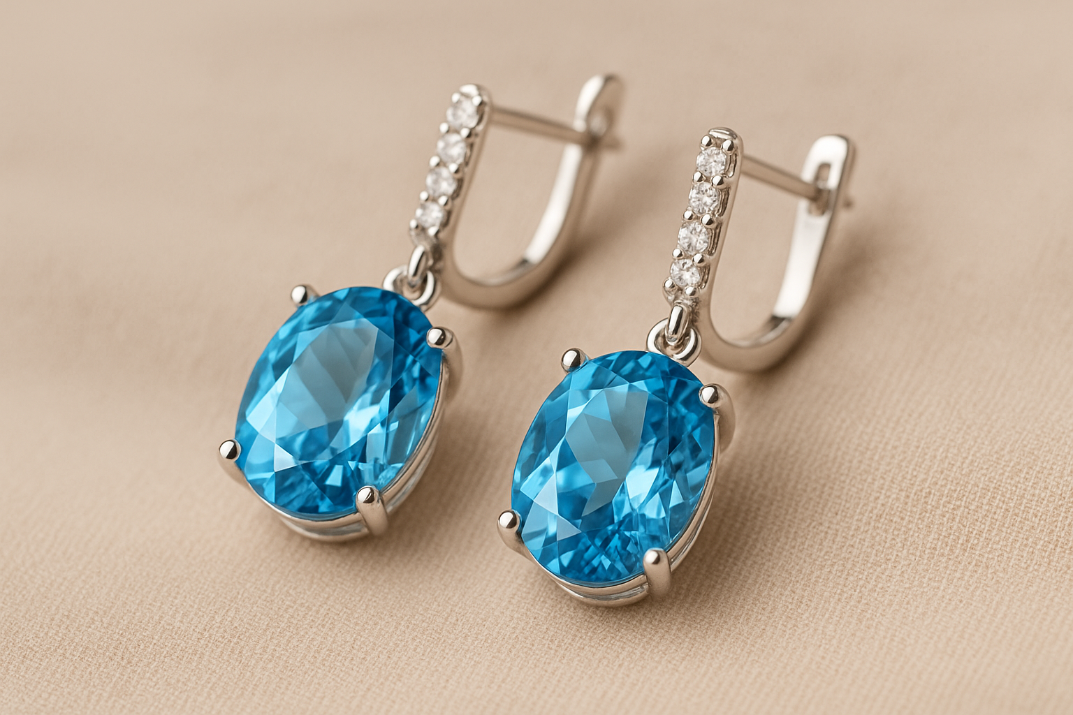 Mėlyni topazo auskarai