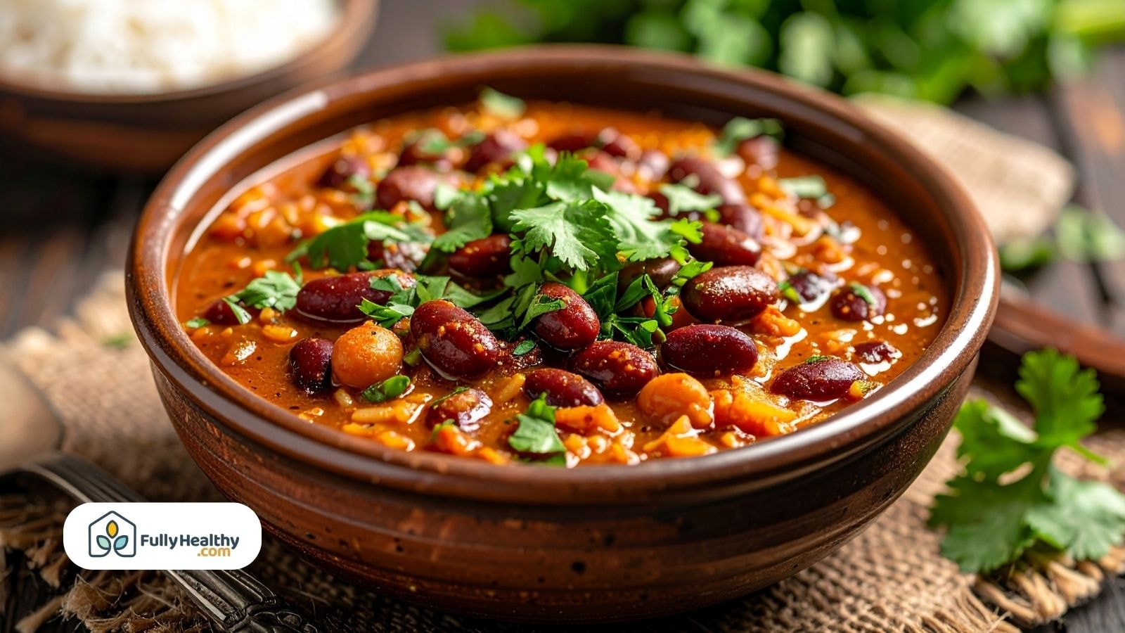 Warm chili dish topped with fresh cilantro garnish