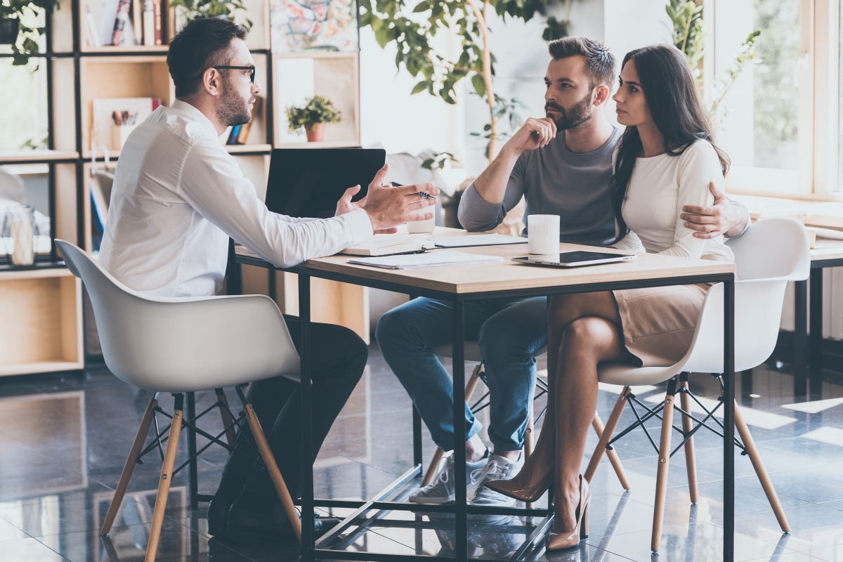 Couple meeting with Financial Advisor