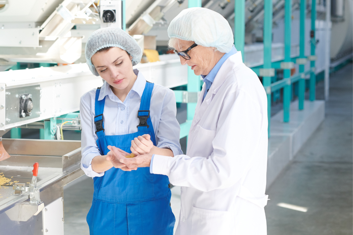 Inspectors reviewing supplement ingredients on-site during a facility walkthrough