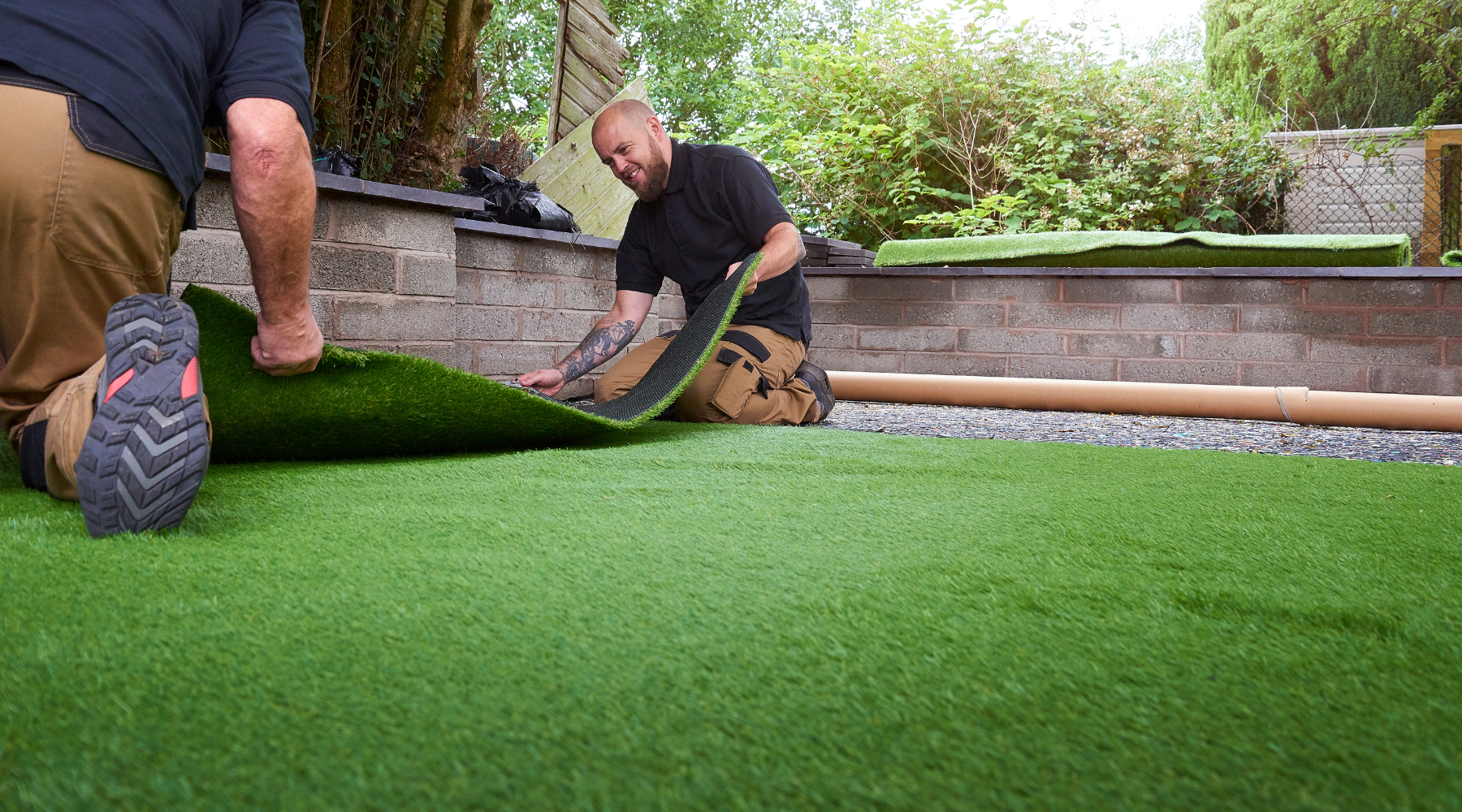 contractor laying turf