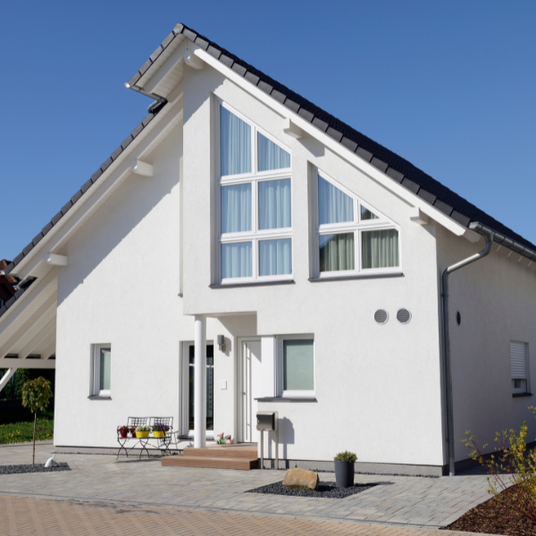 An image showing new windows enhancing a home's exterior appearance.