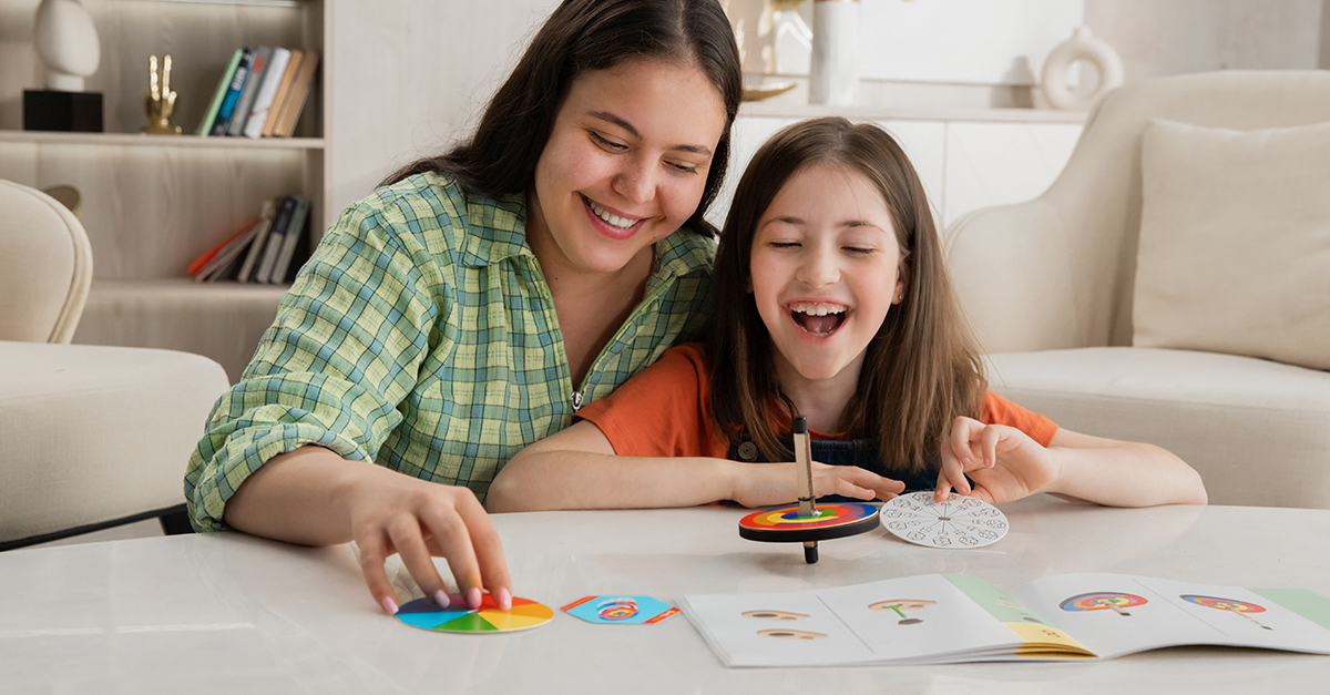 A parent introducing her child to simple STEM activities, a fun activity to do as a family