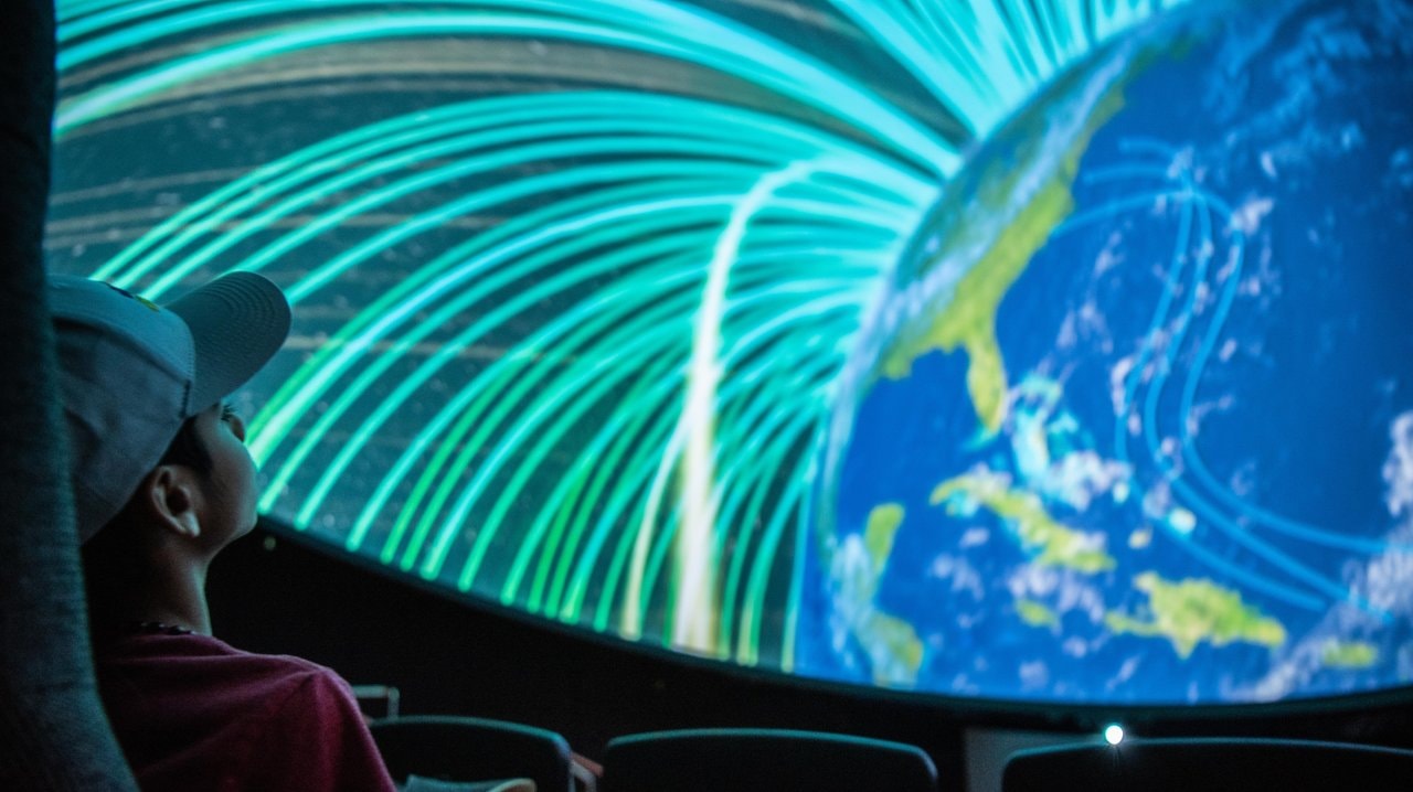 Indoor family activity where kids can learn and view space exhibits on a rainy day.