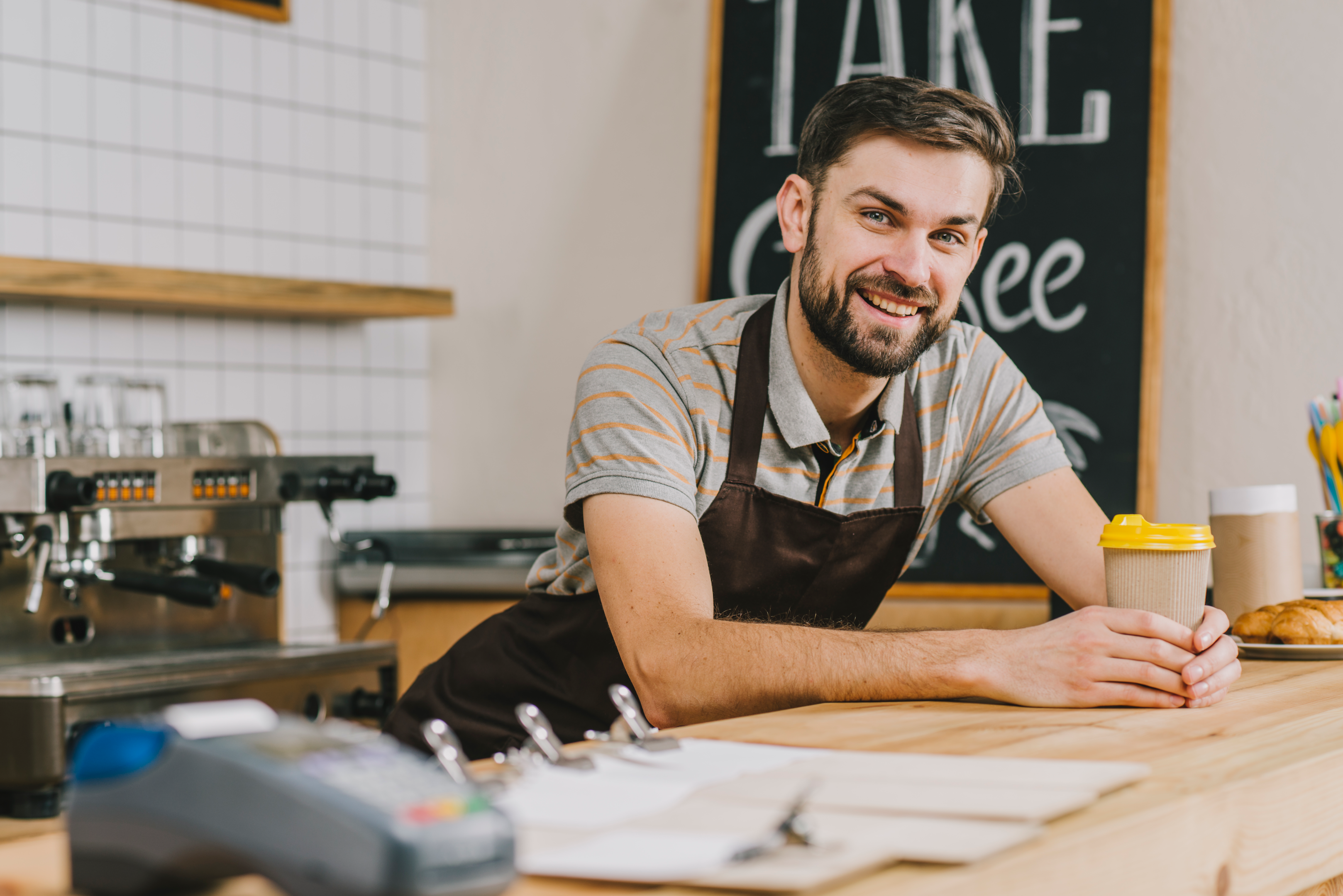 A determined small business owner standing confidently.