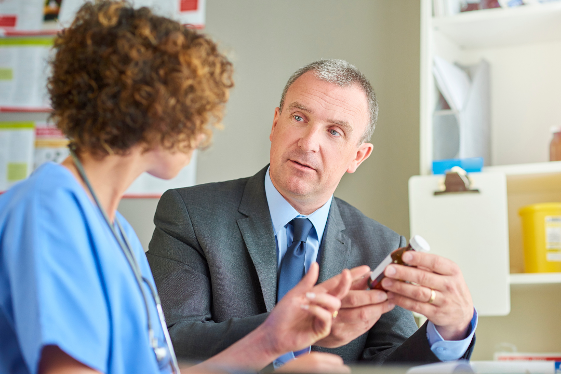 Supplement manufacturer discussing product label and transparency with a healthcare professional