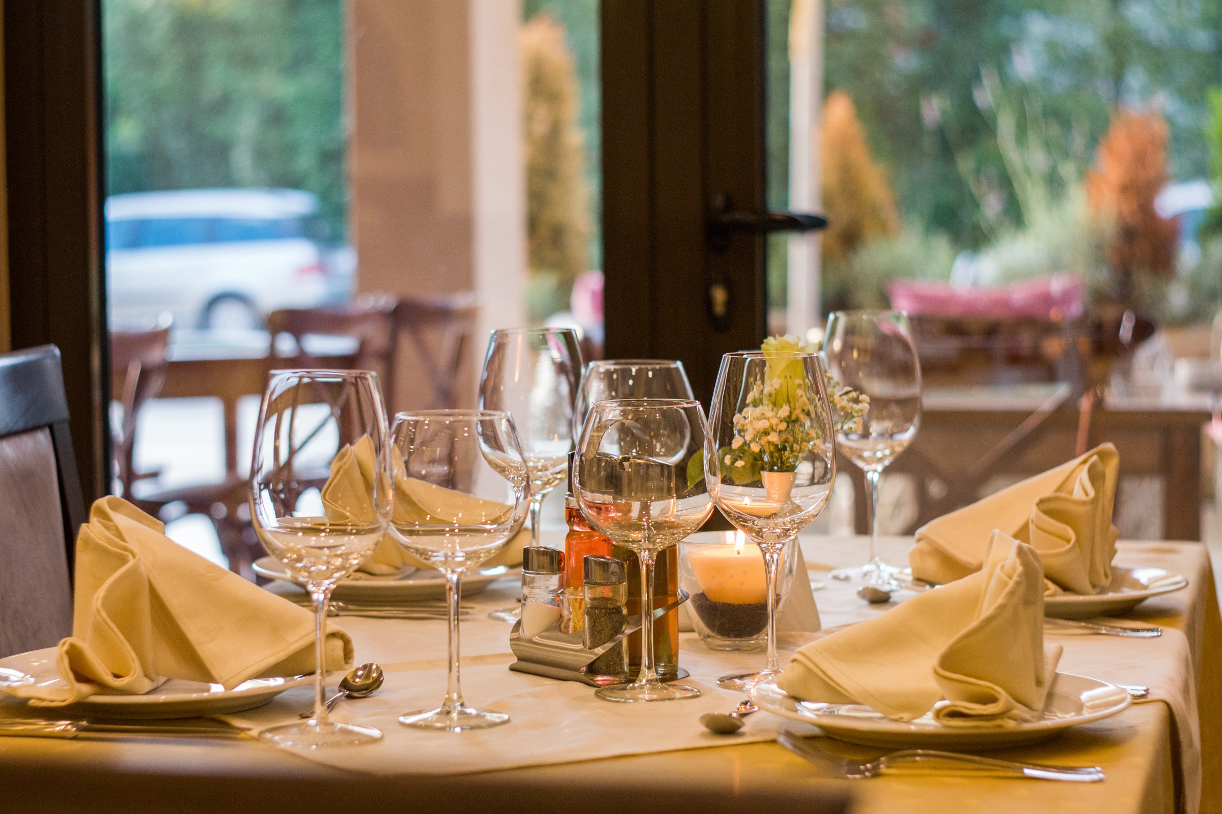 table with meal and wine glasses