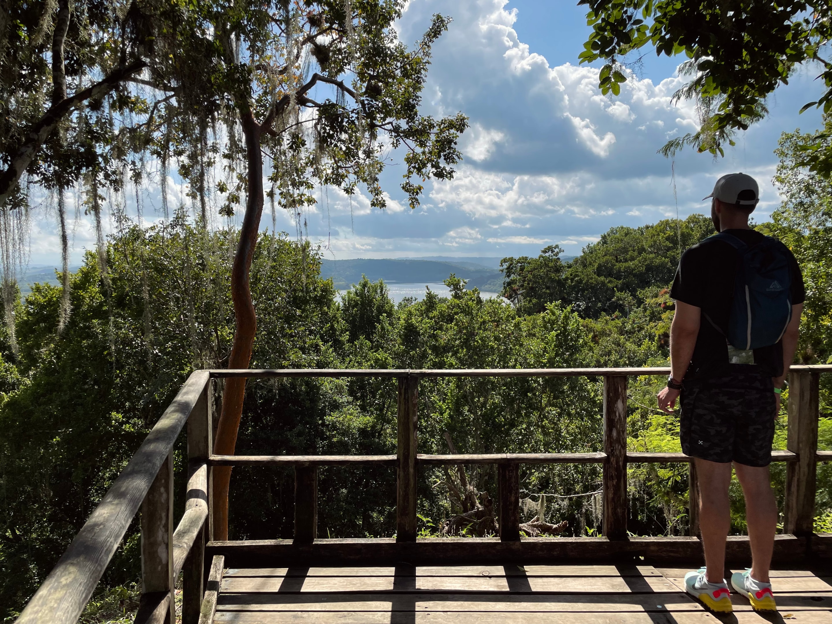 Standing on a platform overlooking the jungle in Yaxha National Park, Guatemala