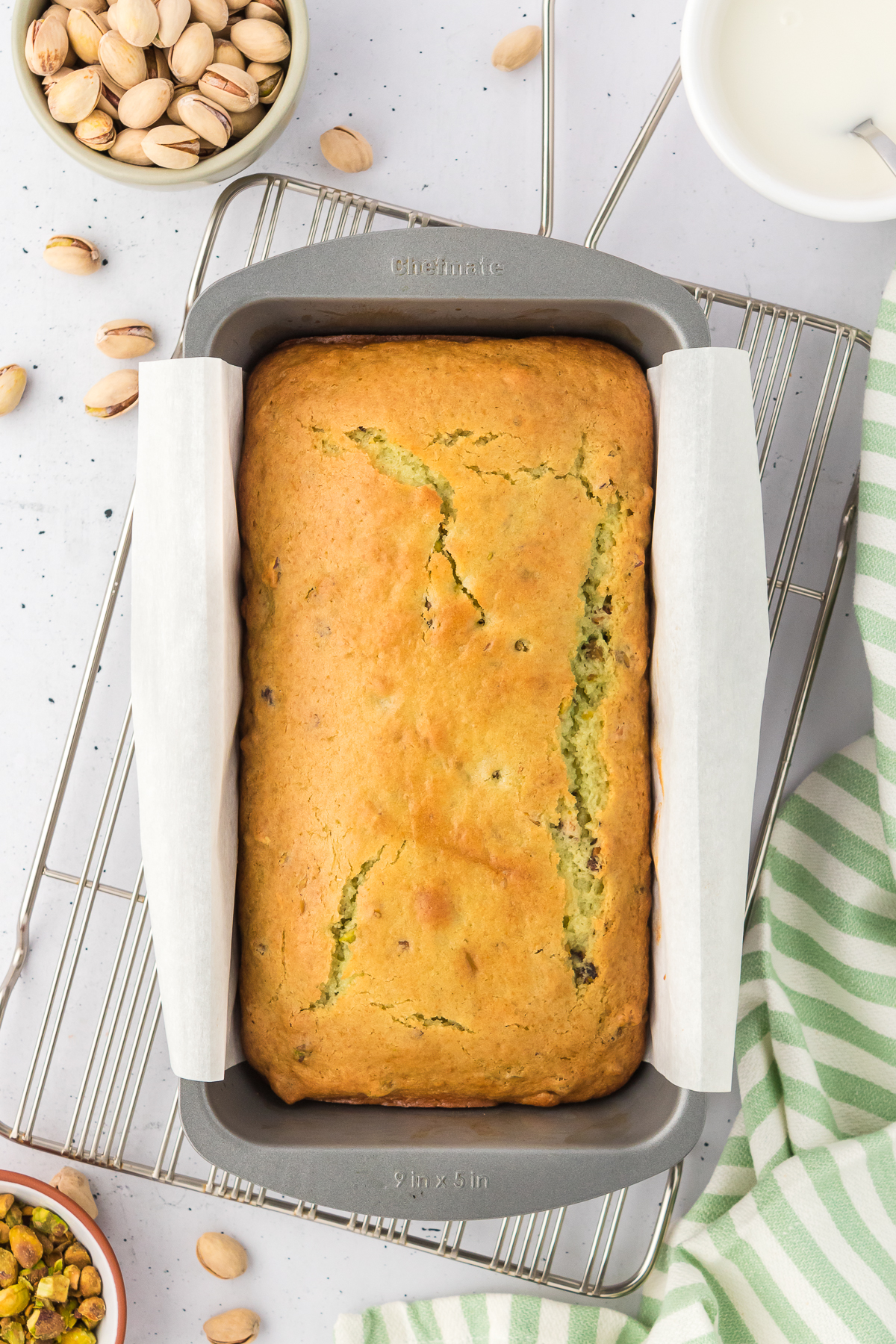 baked pistachio loaf bread in loaf pan