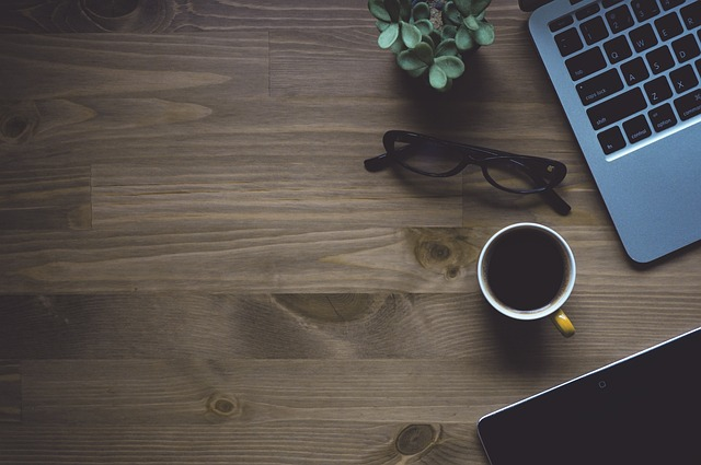 workspace, coffee, laptop, ecommerce automation software, automating your ecommerce, ecommerce automation tools