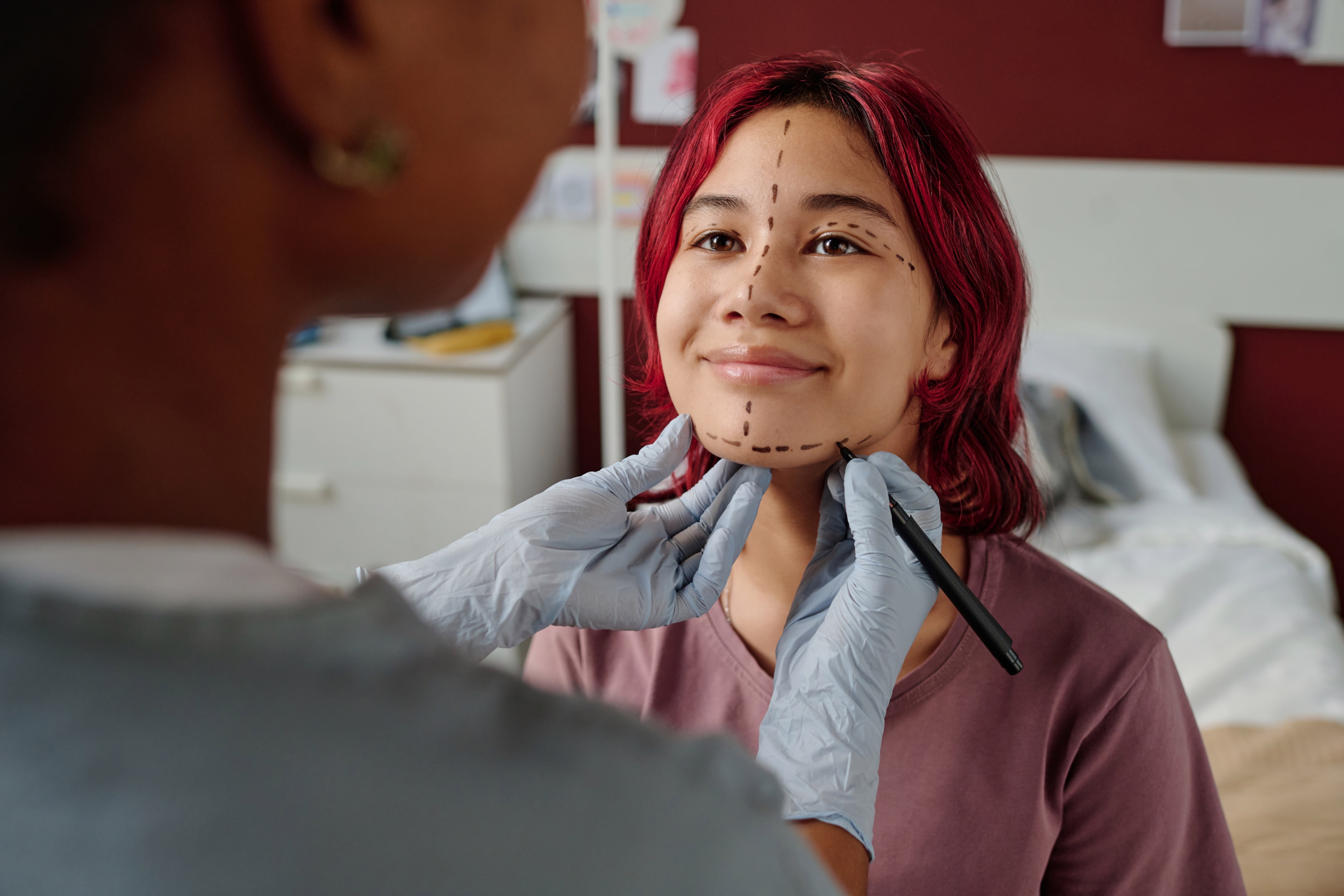 An image of a woman who has a growth defect on her jaw and having a bad bite.