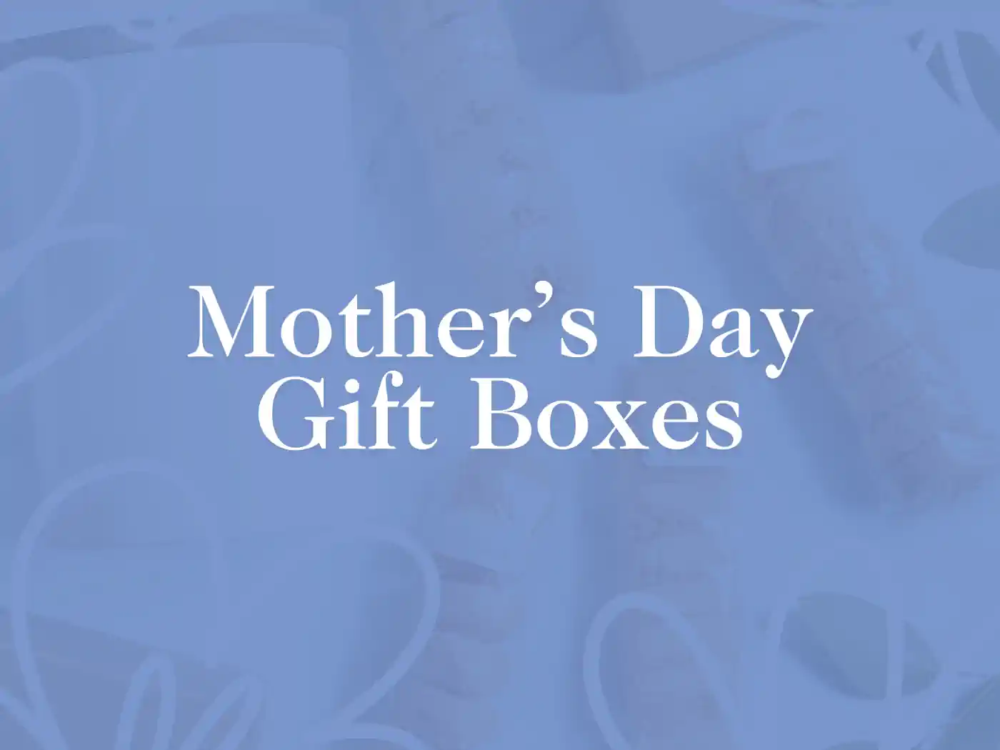 close-up of beautifully wrapped Mother's Day gift boxes with delicate ribbons. Fabulous Flowers and Gifts - Mother's Day Gift Boxes.