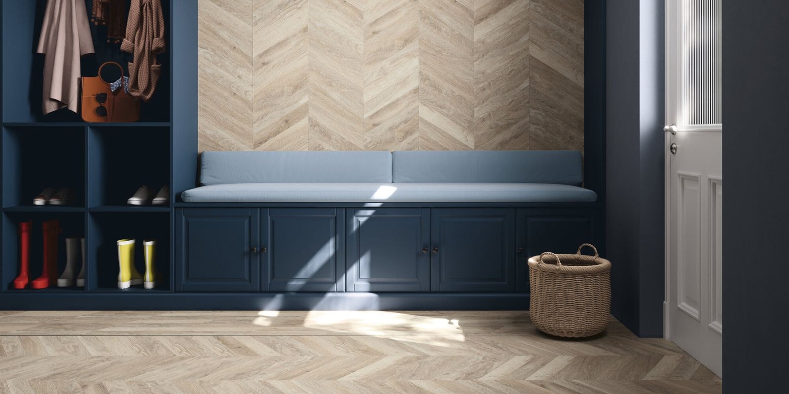Light Beige Herringbone floor tiles with contrasting deep blue storage shelving and cupboards.
