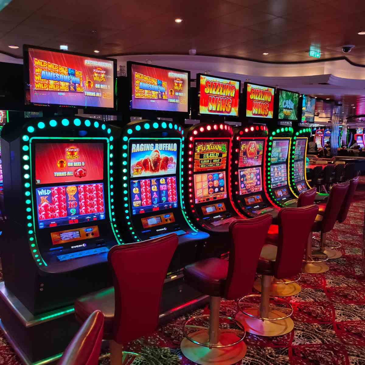 Miami, USA - April 29, 2022: Casino interior, gaming slot machines, American gambling at Symphony of the seas is the biggest cruise ship at Miami, USA on April 29, 2022 