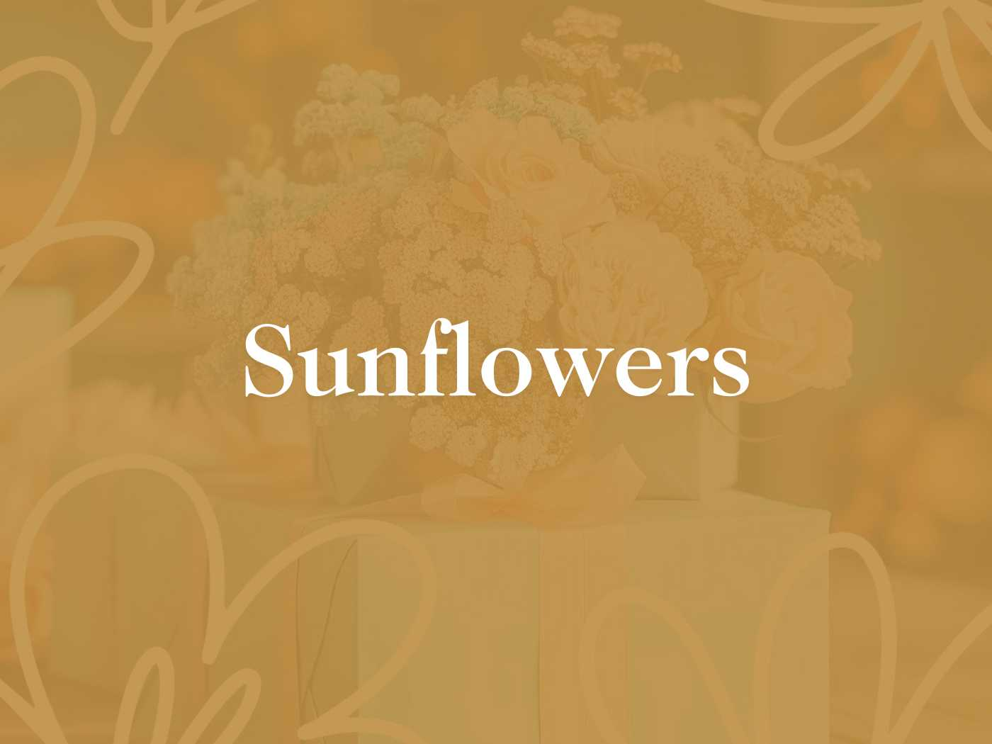 A monochromatic sepia-toned floral display featuring a bouquet of sunflowers subtly blending into a similarly hued background, part of the Sunflowers Collection by Fabulous Flowers and Gifts.