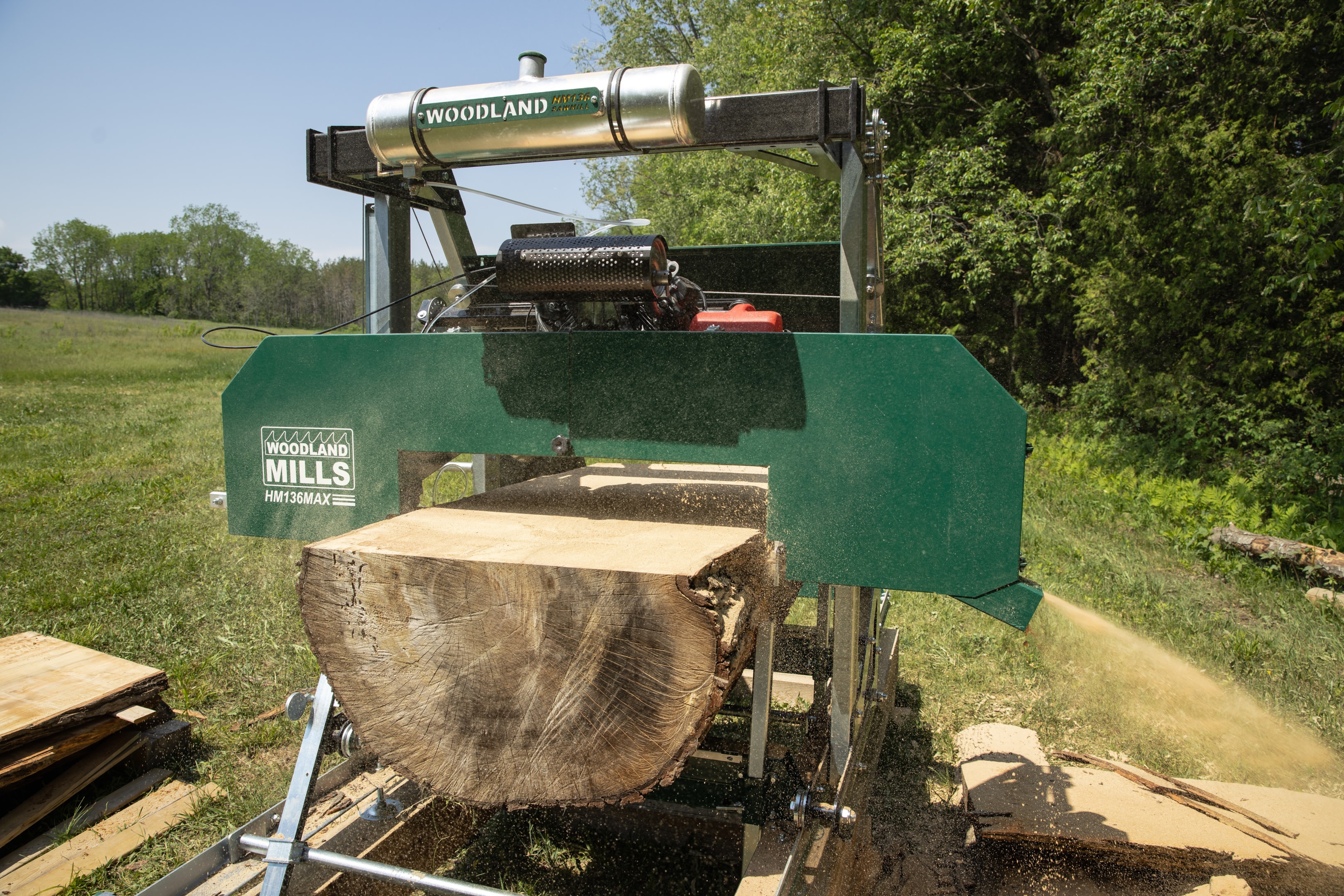 An HM136 Portable Sawmill, lauded for its smooth operation. 