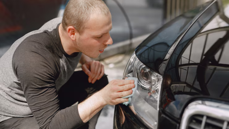A professional cleaning Bi-LED Headlights with microfiber towel