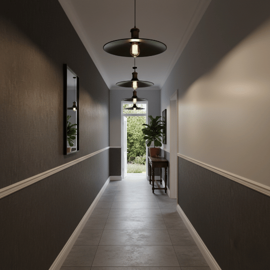 Wide metal shade pendant lights spreading light across a narrow hallway.