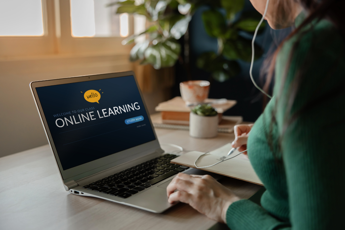 A remote employee focused on an online learning session