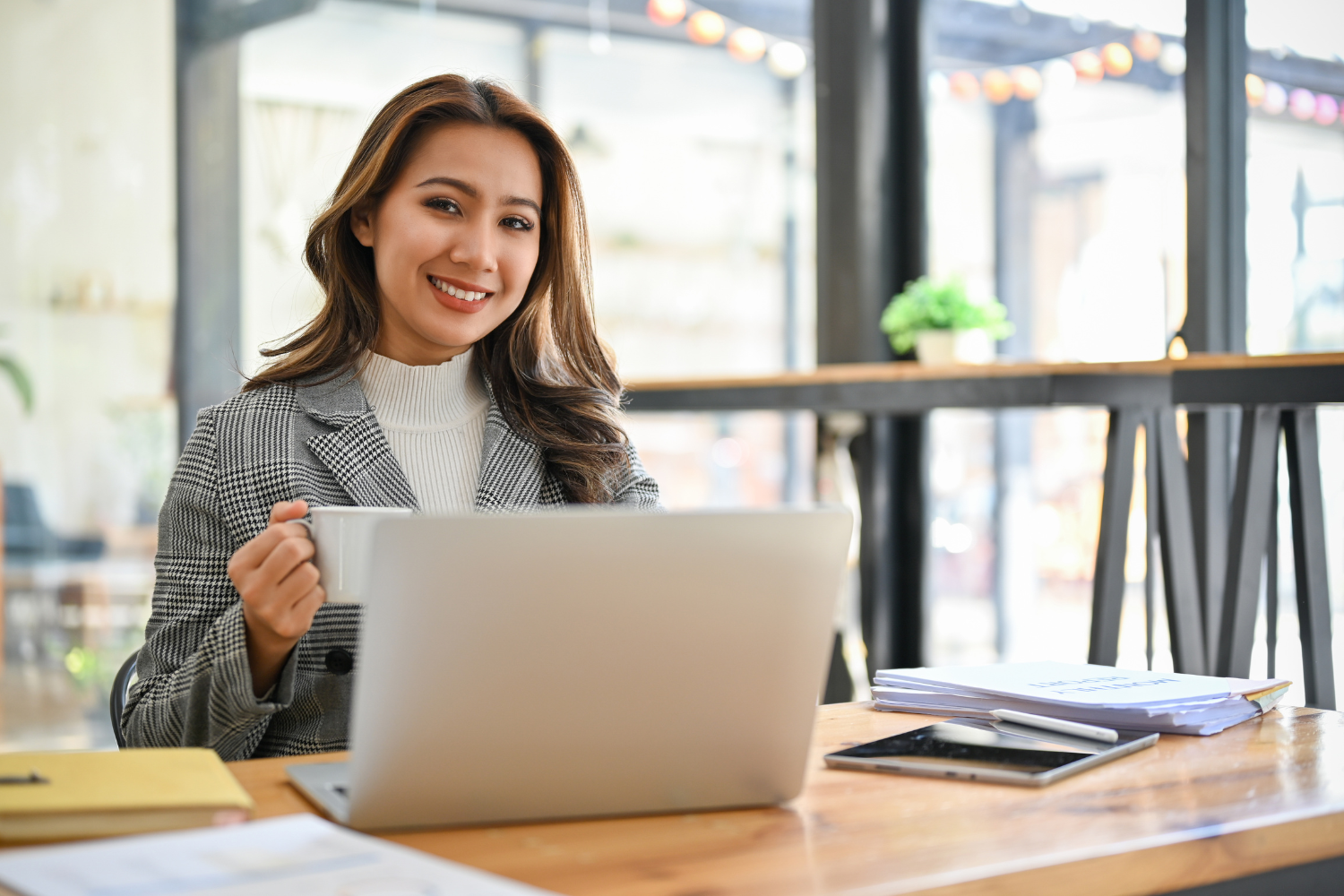 A Filipino remote worker on her laptop.
