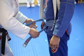 white and blue belts - blue belt